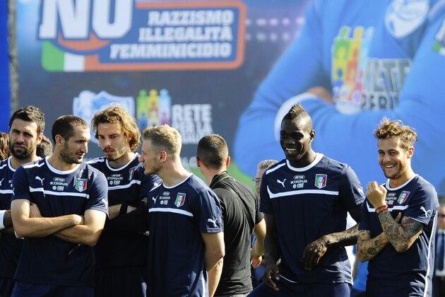 The Italian national team prior to a training session at the Giarrusso stadium in the outskirts of Naples, Monday, Oct. 14, 2013, ahead of a 2014 FIFA World Cup, Group B, qualification match against Armenia in Naples on Tuesday.  Other teams in Group B are, Denmark, Bulgaria, Czech Republic, and Malta. (AP Photo/Salvatore Laporta)