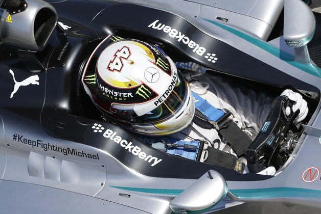 Mercedes driver Lewis Hamilton of Britain steers his car during the second free practice at the Barcelona Catalunya racetrack in Montmelo, near Barcelona, Spain, Friday, May 9, 2014. Lewis Hamilton finished Friday's opening day of practice at the Spanish Grand Prix with the top times from both training sessions. The British driver is looking to add to his three poles positions and hat trick of wins after four races this season. The Formula One race will be held on Sunday. (AP Photo/Luca Bruno)