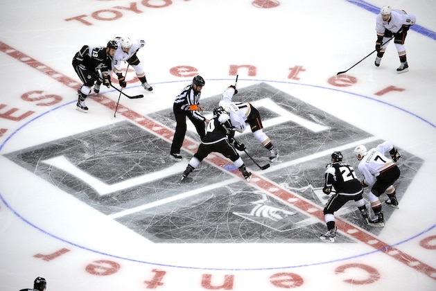 LOS ANGELES, CA - MAY 8:  Mike Richards #10 of the Los Angeles Kings takes the face-off against Saku Koivu #11of the Anaheim Ducks in Game Three of the Second Round of the 2014 Stanley Cup Playoffs at Staples Center on May 8, 2014 in Los Angeles, California. (Photo by Noah Graham/NHLI via Getty Images)