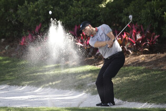 Martin Kaymer of Germany, hits from a sand trap on the 14th fairway during the second round of The Players championship golf tournament at TPC Sawgrass, Friday, May 9, 2014, in Ponte Vedra Beach, Fla. (AP Photo/John Raoux)