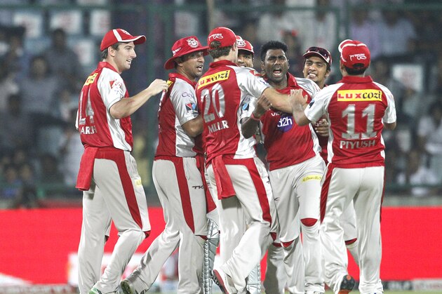 Kings XI Punjab Parvinder Awana , third left,celebrates the wicket of Delhi Daredevils' Ross Taylor,unseen,  during an Indian Premier League (IPL) cricket match, in New Delhi, India , Tuesday, May 15, 2012.  (AP Photo/ Manish Swarup)