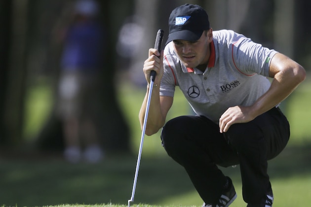 Martin Kaymer of Germany, looks at his shot on the eighth green during the second round of The Players championship golf tournament at TPC Sawgrass, Friday, May 9, 2014 in Ponte Vedra Beach, Fla. (AP Photo/Gerald Herbert)