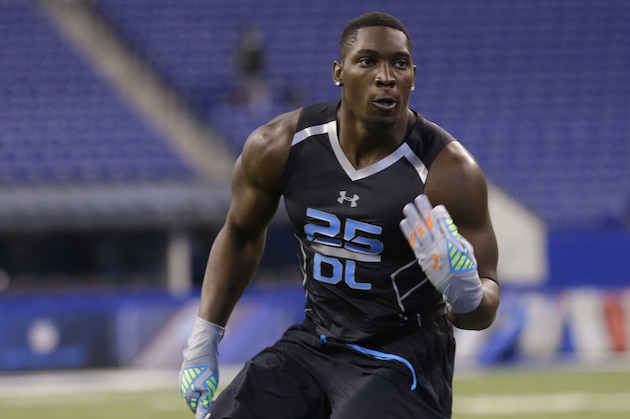 Boise State defensive lineman Demarcus Lawrence runs a drill at the NFL football scouting combine in Indianapolis, Monday, Feb. 24, 2014. (AP Photo/Michael Conroy)