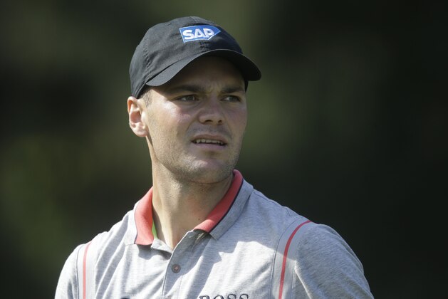 Martin Kaymer of Germany, watches his shot from the seventh tee during the second round of The Players championship golf tournament at TPC Sawgrass, Friday, May 9, 2014 in Ponte Vedra Beach, Fla. (AP Photo/Gerald Herbert)