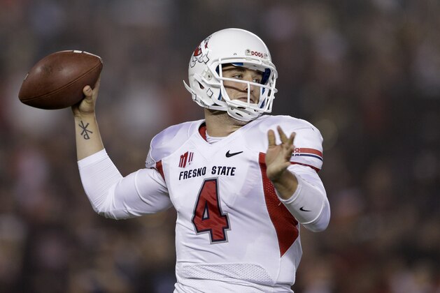 Fresno State quarterback Derek Carr throws a pass while playing against San Diego State during the first half in an NCAA college football game Saturday, Oct. 26, 2013, in San Diego. (AP Photo/Gregory Bull)