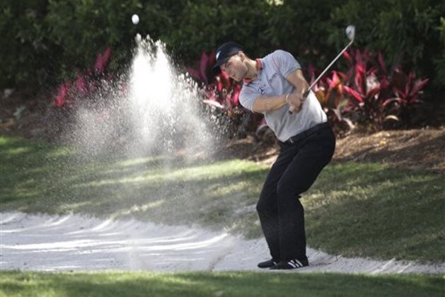 Martin Kaymer of Germany, hits from a sand trap on the 14th fairway during the second round of The Players championship golf tournament at TPC Sawgrass, Friday, May 9, 2014, in Ponte Vedra Beach, Fla. (AP Photo/John Raoux)