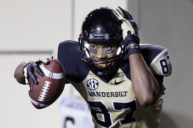 Vanderbilt wide receiver Jordan Matthews (87) celebrates after catching a 5-yard touchdown pass against UAB in the fourth quarter of an NCAA college football game on Saturday, Sept. 28, 2013, in Nashville, Tenn. Vanderbilt won 52-24. (AP Photo/Mark Humphrey)