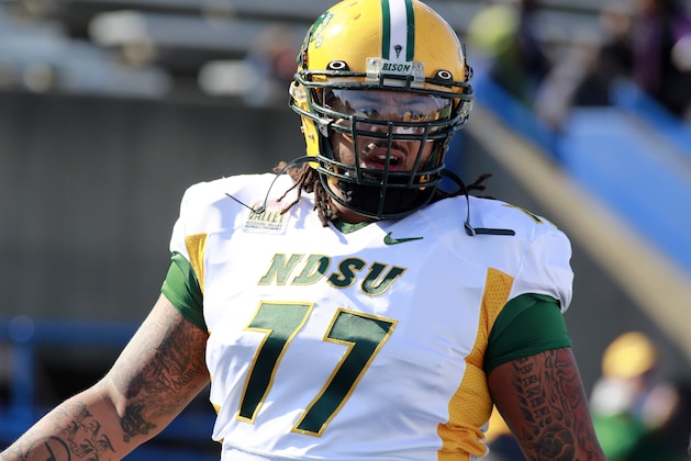 North Dakota State offensive tackle Billy Turner warms up before an NCAA college football game versus Indiana State in Terre Haute, Ind., Saturday, Oct. 26, 2013.  (AP Photo/Brent Smith)