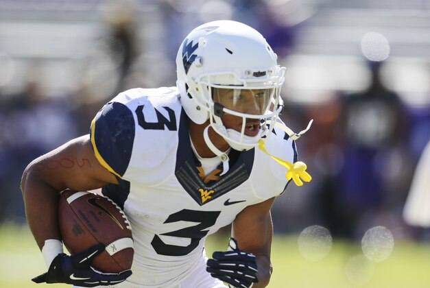 Nov 2, 2013; Fort Worth, TX, USA; West Virginia Mountaineers running back Charles Sims (3) warms up before the game against the TCU Horned Frogs at Amon G. Carter Stadium. Mandatory Credit: Kevin Jairaj-USA TODAY Sports