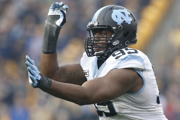 North Carolina defensive end Kareem Martin (95) in action in an NCAA football game between Pittsburgh and North Carolina, Saturday, Nov. 16, 2013 in Pittsburgh. (AP Photo/Keith Srakocic)