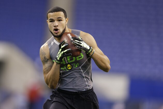 Rice defensive back Phillip Gaines runs a drill at the NFL football scouting combine in Indianapolis, Tuesday, Feb. 25, 2014. (AP Photo/Michael Conroy)