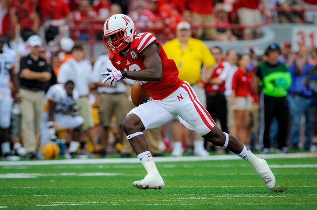LINCOLN, NE - SEPTEMBER 7: Cornerback Stanley Jean-Baptiste #16 of the Nebraska Cornhuskers intercepts a pass in front of wide receiver Rickey Bradley #81 of the Southern Miss Golden Eagles during their game at Memorial Stadium on September 7, 2013 in Lincoln, Nebraska. (Photo by Eric Francis/Getty Images)