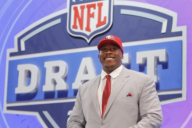 USC center Marcus Martin poses for photos after being selected as the 70th pick by the San Francisco 49ers in the third round of the 2014 NFL Draft, Friday, May 9, 2014, in New York. (AP Photo/Jason DeCrow)