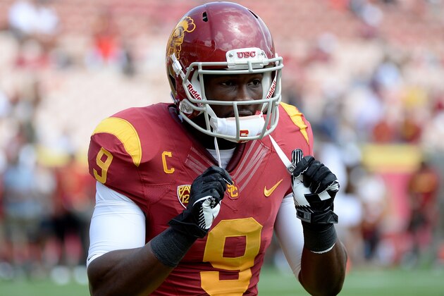 LOS ANGELES, CA - SEPTEMBER 21:  Marqise Lee #9 of the USC Trojans warms up before the game against the Utah State Aggies at the Los Angeles Memorial Coliseum on September 21, 2013 in Los Angeles, California.  (Photo by Harry How/Getty Images)