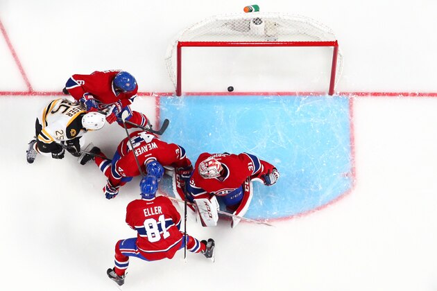 MONTREAL, QC - MAY 8: Matt Fraser #25 of the Boston Bruins scores his overtime goal against Carey Price #31, Douglas Murray #6, Mike Weaver #43 and Lars Eller #81 of the Montreal Canadiens in Game Four of the Second Round of the 2014 NHL Stanley Cup Playoffs at the Bell Centre on May 8, 2014 in Montreal, Quebec, Canada. (Photo by Francois Laplante/Freestyle Photography/Getty Images)