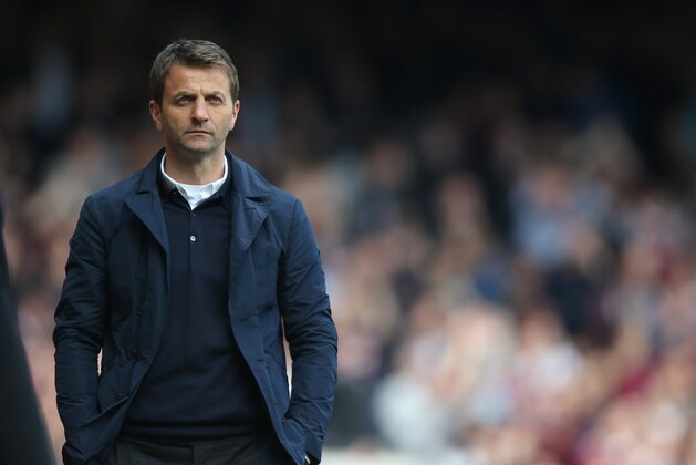 Tottenham's manager Tim Sherwood watches his team play from the technical area during their English Premier League soccer match between West Ham United and Tottenham Hotspur at the Boleyn stadium in London Saturday, May  3  2014. (AP Photo/Alastair Grant)