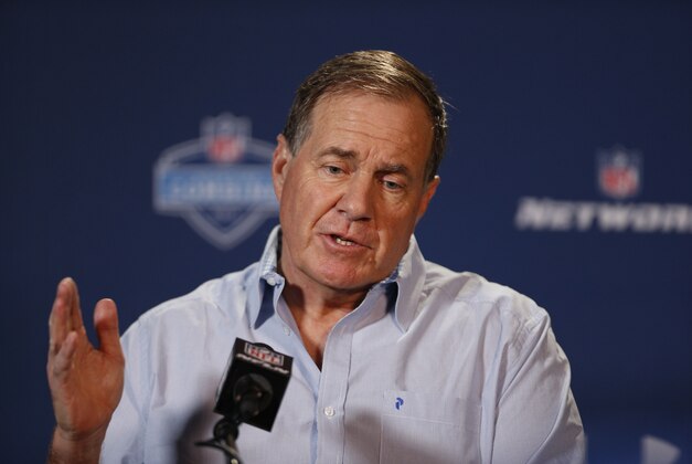 Feb 20, 2014; Indianapolis, IN, USA; New England Patriots coach Bill Belichick speaks during a press conference during the 2014 NFL Combine at Lucas Oil Stadium. Mandatory Credit: Brian Spurlock-USA TODAY Sports