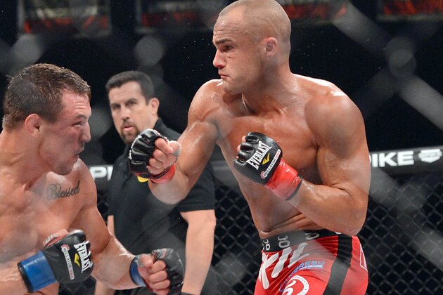 Nov 2, 2013; Long Beach, CA, USA;   Eddie Alvarez (red gloves) and Michael Chandler (blue gloves) during their Bellator lightweight world championship fight at the Long Beach Arena. Alvarez won the fight. Mandatory Credit: Jayne Kamin-Oncea-USA TODAY Sports