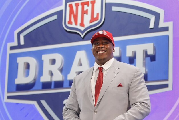 USC center Marcus Martin poses for photos after being selected as the 70th pick by the San Francisco 49ers in the third round of the 2014 NFL Draft, Friday, May 9, 2014, in New York. (AP Photo/Jason DeCrow)