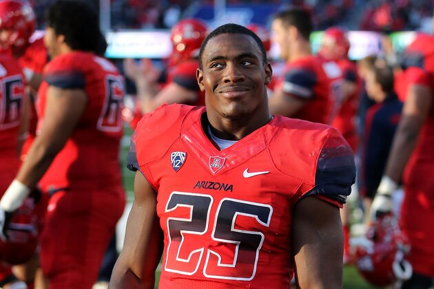 TUCSON, AZ - NOVEMBER 23:  Running back Ka'Deem Carey #25 of the Arizona Wildcats reacts on the sidelines during the college football game against the Oregon Ducks at Arizona Stadium on November 23, 2013 in Tucson, Arizona. The Wildcats defeated the Ducks 42-16.  (Photo by Christian Petersen/Getty Images)
