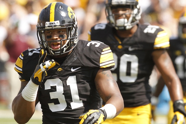 IOWA CITY, IOWA- SEPTEMBER 7:  Linebacker Anthony Hitchens #31 of the Iowa Hawkeyes during a break in the action in the second quarter against the Missouri State Bears on September 7, 2013 at Kinnick Stadium in Iowa City, Iowa. Iowa won 28-14. (Photo by Matthew Holst/Getty Images)