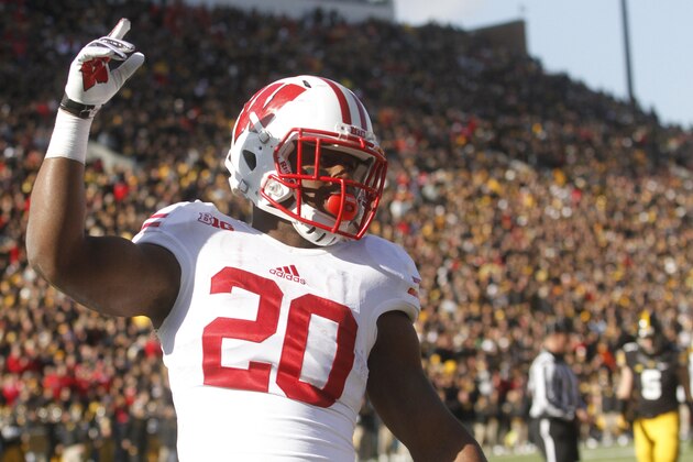 IOWA CITY, IOWA - NOVEMBER 2:  Running back James White #20 of the Wisconsin Badgers celebrates a touchdown during the fourth quarter against the Iowa Hawkeyes on November 2, 2013 at Kinnick Stadium in Iowa City, Iowa. Wisconsin won 28-9.(Photo by Matthew Holst/Getty Images)