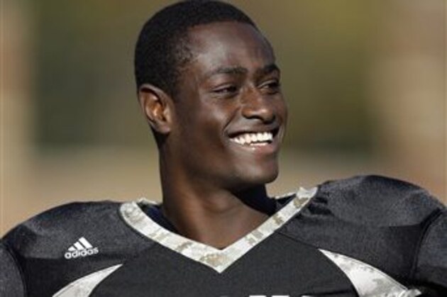 FILE - In this Nov. 9, 2013 file photo, Lindenwood cornerback Pierre Desir smiles on the sideline before the start of an NCAA football game against Pittsburg State in St. Charles, Mo. Desir starts working out Tuesday, Feb. 25, 2014, at Lucas Oil Stadium with the other defensive backs at the NFL’s scouting combine. (AP Photo/Jeff Roberson, File)