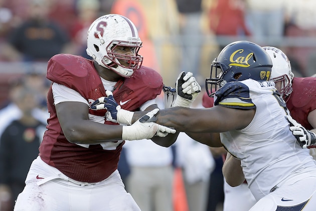 Stanford offensive tackle Cameron Fleming (73) in action against California defensive lineman Deandre Coleman (91) during the second half in an NCAA college football game in Stanford, Calif., Saturday, Nov. 23, 2013. (AP Photo/Tony Avelar)
