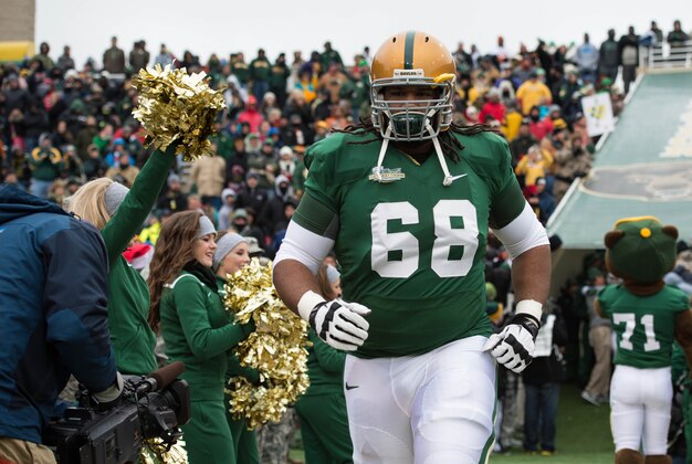 Dec 7, 2013; Waco, TX, USA; Baylor Bears guard Cyril Richardson (68) takes the field to face the Texas Longhorns at Floyd Casey Stadium. The Baylor Bears defeated the Texas Longhorns 30-10 to win the Big 12 championship. Mandatory Credit: Jerome Miron-USA TODAY Sports