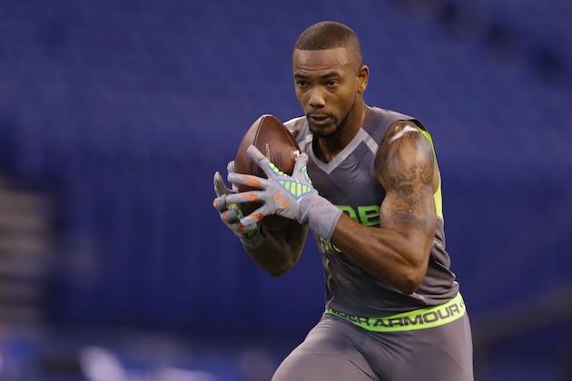 Utah defensive back Keith McGill runs a drill at the NFL football scouting combine in Indianapolis, Tuesday, Feb. 25, 2014. (AP Photo/Michael Conroy)