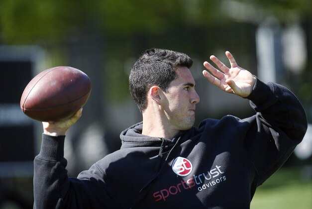 Georgia quarterback Aaron Murray works out for NFL football scouts during the school's pro day Wednesday, April 16, 2014 in Athens, Ga.   (AP Photo/John Bazemore)