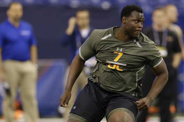 Tennessee State offensive lineman Kadeem Edwards runs a drill at the NFL football scouting combine in Indianapolis, Saturday, Feb. 22, 2014. (AP Photo/Michael Conroy)
