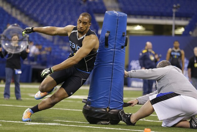 Bloomsburg defensive lineman Larry Webster runs a drill at the NFL football scouting combine in Indianapolis, Monday, Feb. 24, 2014. (AP Photo/Michael Conroy)