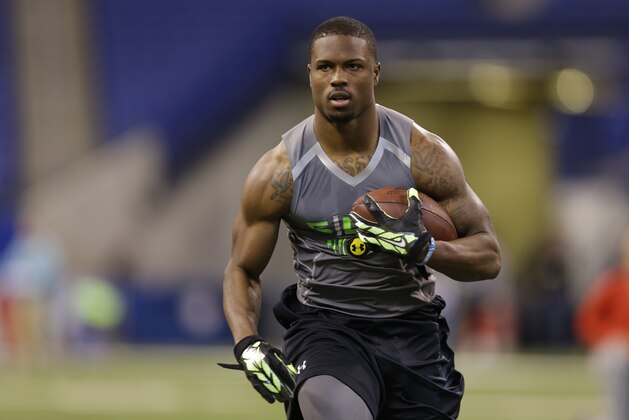 San Jose State defensive back Bene' Benwikere runs a drill at the NFL football scouting combine in Indianapolis, Tuesday, Feb. 25, 2014. (AP Photo/Michael Conroy)