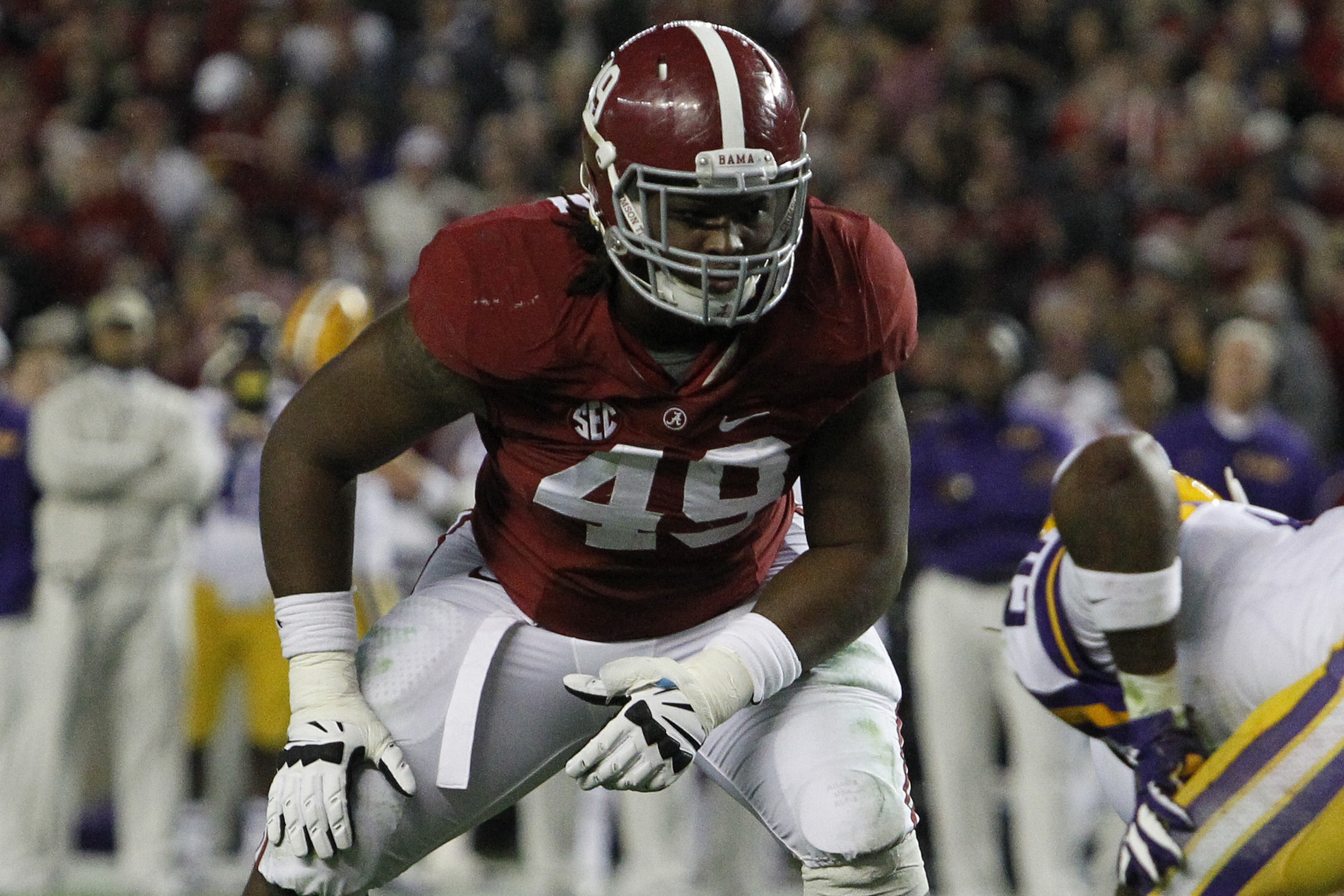 Alabama defensive lineman Ed Stinson (49) works against LSU during the first half of an NCAA college football game, Saturday, Nov. 9, 2013, in Tuscaloosa, Ala. (AP Photo/Butch Dill) Alabama defensive lineman Ed Stinson (49) works against LSU during the first half of an NCAA college football game, Saturday, Nov. 9, 2013, in Tuscaloosa, Ala. (AP Photo/Butch Dill)