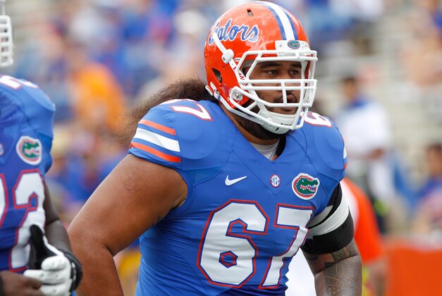 Sep 21, 2013; Gainesville, FL, USA; Florida Gators offensive linesman Jon Halapio (67) runs back into the locker room prior to the game at against the Tennessee Volunteers Ben Hill Griffin Stadium. Mandatory Credit: Kim Klement-USA TODAY Sports