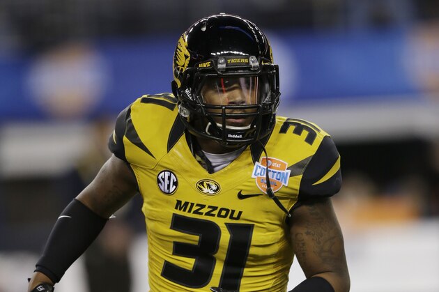 Missouri defensive back E.J. Gaines (31) warms up before an NCAA college football game against Oklahoma State, Friday, Jan. 3, 2014, in Arlington, Texas.  (AP Photo/Tim Sharp)