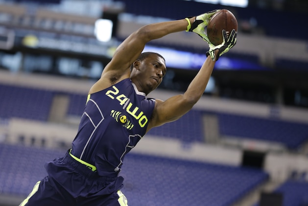 Coastal Carolina wide receiver Matt Hazel makes a catch during a drill at the NFL football scouting combine in Indianapolis, Sunday, Feb. 23, 2014. (AP Photo/Michael Conroy)