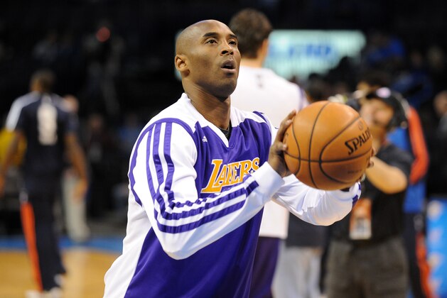 Dec 13, 2013; Oklahoma City, OK, USA; Los Angeles Lakers shooting guard Kobe Bryant warms up prior to the game against the Oklahoma City Thunder at Chesapeake Energy Arena. Mandatory Credit: Mark D. Smith-USA TODAY Sports