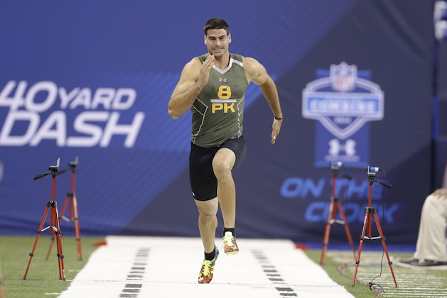 Miami kicker Pat O'Donnell runs the 40-yard dash at the NFL football scouting combine in Indianapolis, Saturday, Feb. 22, 2014. (AP Photo/Nam Y. Huh)