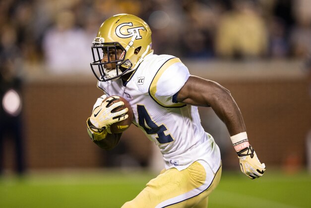 Nov 2, 2013; Atlanta, GA, USA; Georgia Tech Yellow Jackets defensive back Jemea Thomas (14) returns a kickoff against the Pittsburgh Panthers during the fourth quarter at Bobby Dodd Stadium. Tech won 21-10. Mandatory Credit: Kevin Liles-USA TODAY Sports
