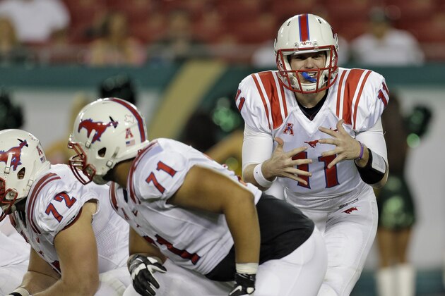 SMU quarterback Garrett Gilbert (11) calls a play against South Florida during the first quarter of an NCAA college football game Saturday, Nov. 23, 2013, in Tampa, Fla. (AP Photo/Chris O'Meara)