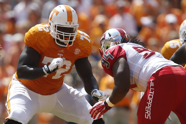 Tennessee offensive lineman Zach Fulton (72) blocks Western Kentucky defensive lineman Bryan Shorter (94)during an NCAA college football game on Saturday, Sept. 7, 2013 in Knoxville, Tenn. (AP Photo/Wade Payne)