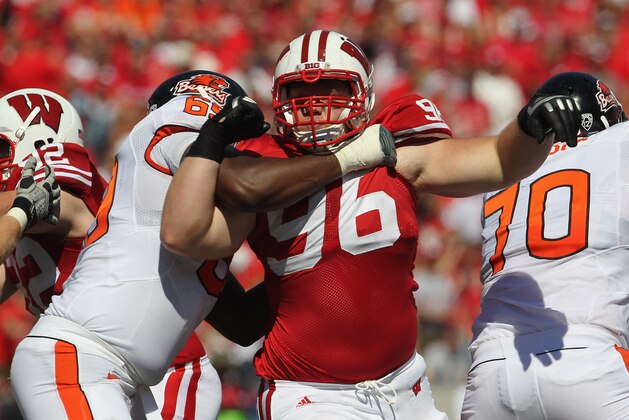MADISON, WI - SEPTEMBER 10:  Beau Allen #96 of the Wisconsin Badgers rushes against Josh Andrews #69 of the Oregon State Beavers at Camp Randall Stadium on September 10, 2011 in Madison Wisconsin. Wisconsin defeated Oregon State 35-0.  (Photo by Jonathan Daniel/Getty Images)