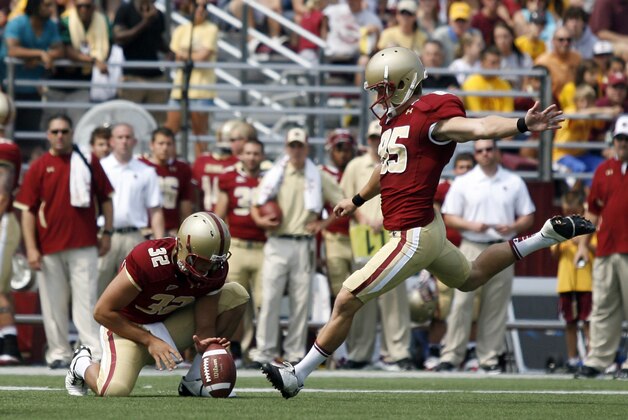 Boston College  kicker Nate Freese (85) takes  field goal try as Boston College's Gerald Levano (32) holds the ball during the first half of their college football game against Northwestern, Saturday, Sept. 3, 2011, in Boston.  (AP Photo/Mary Schwalm)