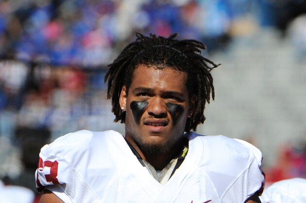 Oct 19, 2013; Lawrence, KS, USA; Oklahoma Sooners fullback Trey Millard (33) warms up before the game against the Kansas Jayhawks at Memorial Stadium. Oklahoma won the game 34-19. Mandatory Credit: John Rieger-USA TODAY Sports