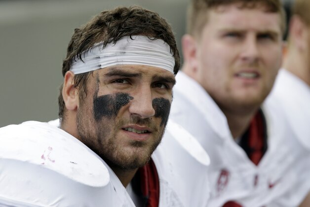 Stanford defensive end Ben Gardner (49) sits on the team bench during the first half of an NCAA college football game against Army on Saturday, Sept. 14, 2013, in West Point, N.Y. (AP Photo/Mike Groll)