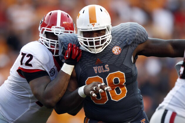 Tennessee defensive lineman Daniel McCullers (98) rushes against Georgia offensive tackle Kenarious Gates (72) in the third quarter of an NCAA college football game on Saturday, Oct. 5, 2013 in Knoxville, Tenn. Georgia won 34-31. (AP Photo/Wade Payne) Tennessee defensive lineman Daniel McCullers (98) rushes against Georgia offensive tackle Kenarious Gates (72) in the third quarter of an NCAA college football game on Saturday, Oct. 5, 2013 in Knoxville, Tenn. Georgia won 34-31. (AP Photo/Wade Payne)