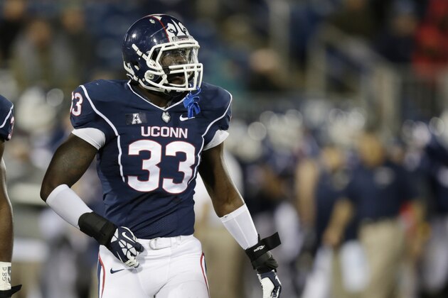 Connecticut Huskies linebacker Yawin Smallwood (33) during the first quarter of an NCAA college football game against Louisville, in East Hartford, Conn., Friday, Nov. 8, 2013. (AP Photo/Charles Krupa)