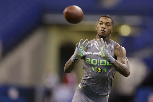 Western Kentucky defensive back Jonathan Dowling runs a drill at the NFL football scouting combine in Indianapolis, Tuesday, Feb. 25, 2014. (AP Photo/Michael Conroy)